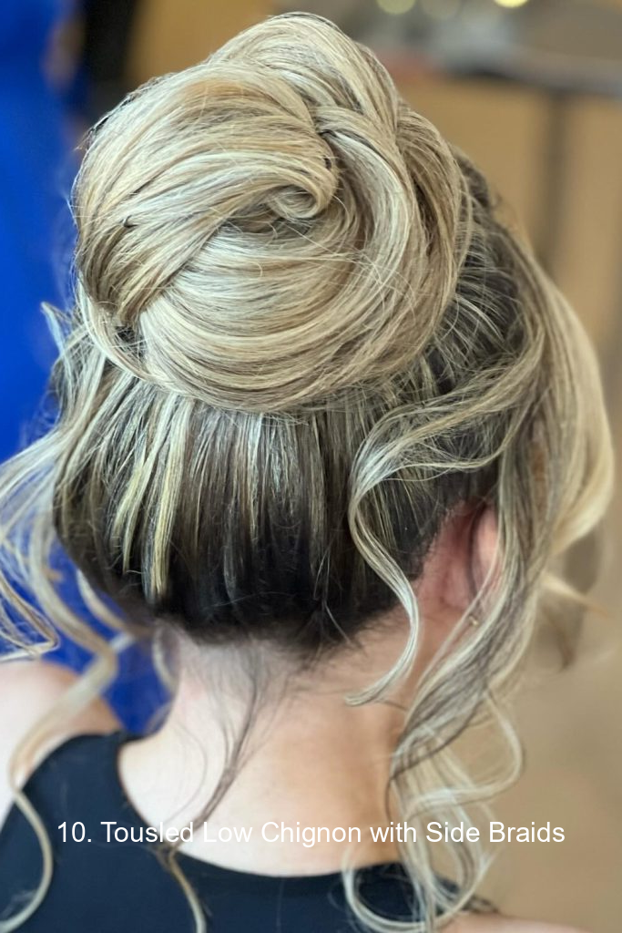 10. Tousled Low Chignon with Side Braids