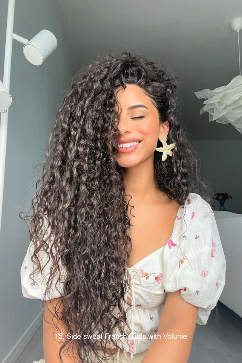 15. Side-swept French Curls with Volume