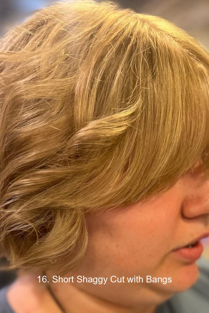 16. Short Shaggy Cut with Bangs