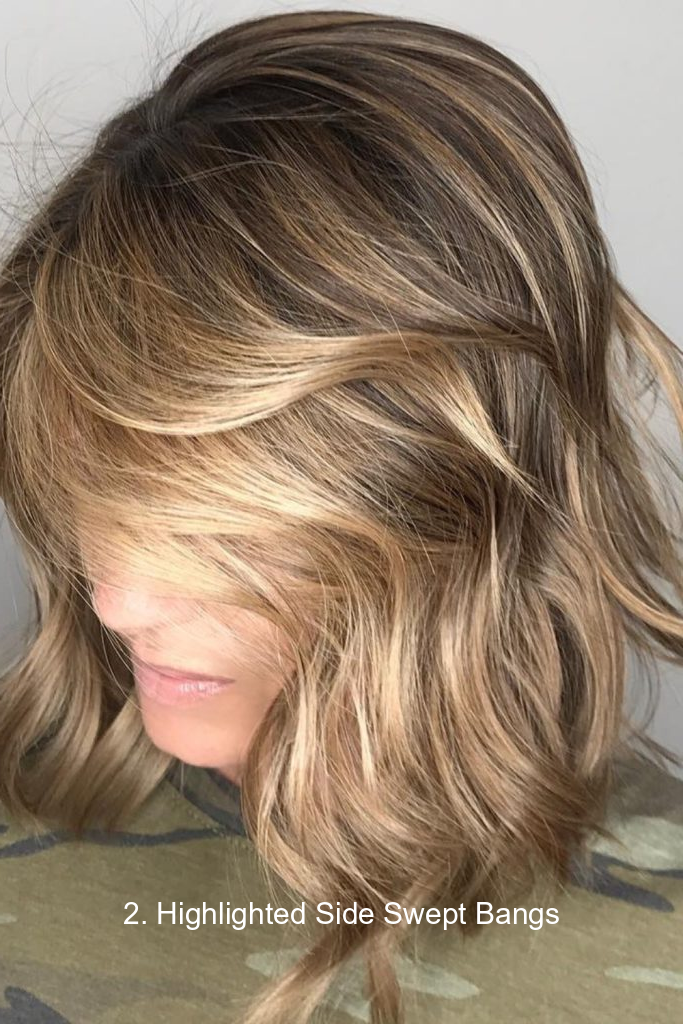 2. Highlighted Side Swept Bangs