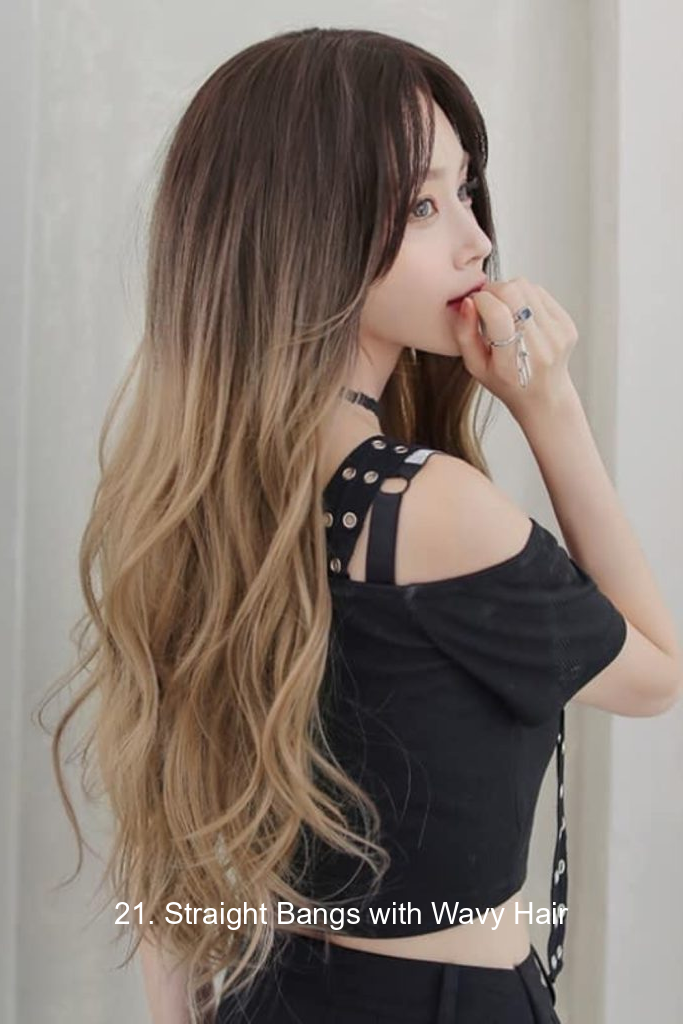 21. Straight Bangs with Wavy Hair