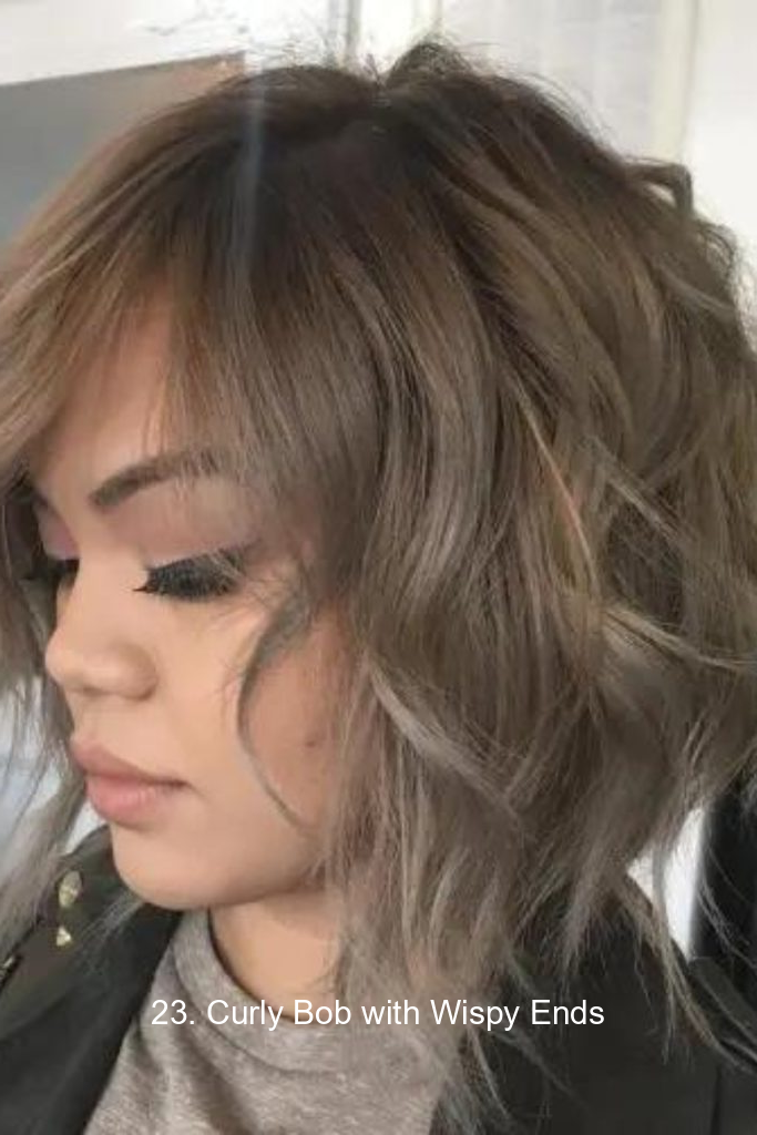 23. Curly Bob with Wispy Ends
