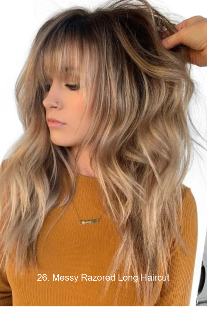 26. Messy Razored Long Haircut