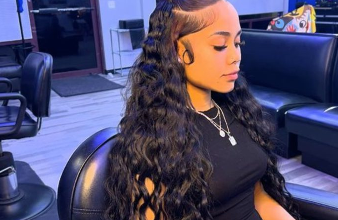 28. Half-Up Wavy Weave