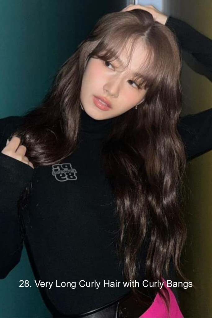 28. Very Long Curly Hair with Curly Bangs