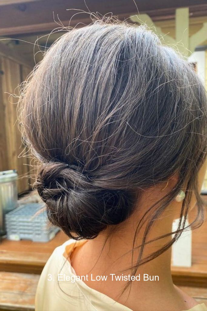 3. Elegant Low Twisted Bun