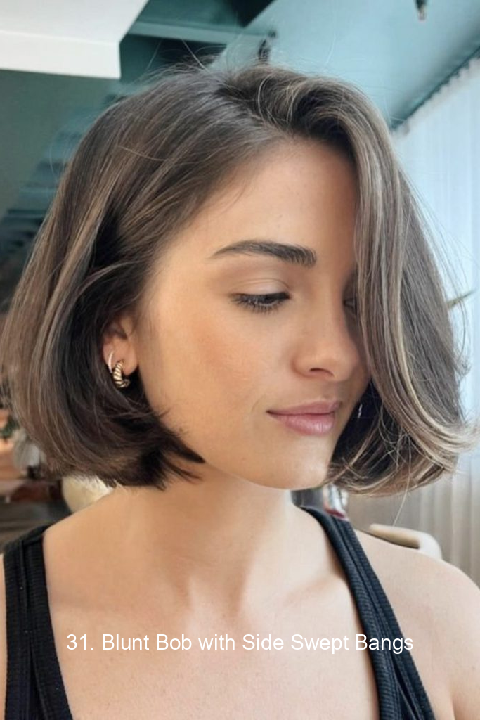31. Blunt Bob with Side Swept Bangs