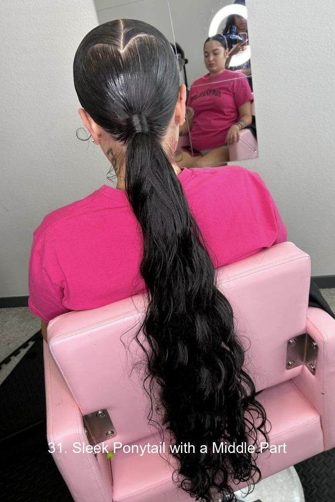 31. Sleek Ponytail with a Middle Part