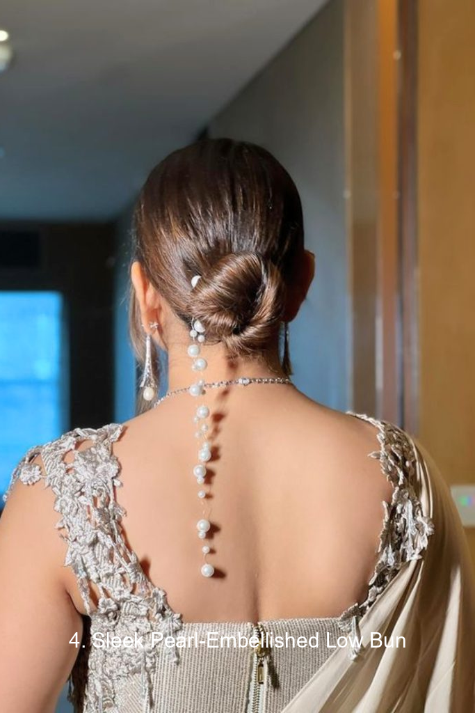 4. Sleek Pearl-Embellished Low Bun