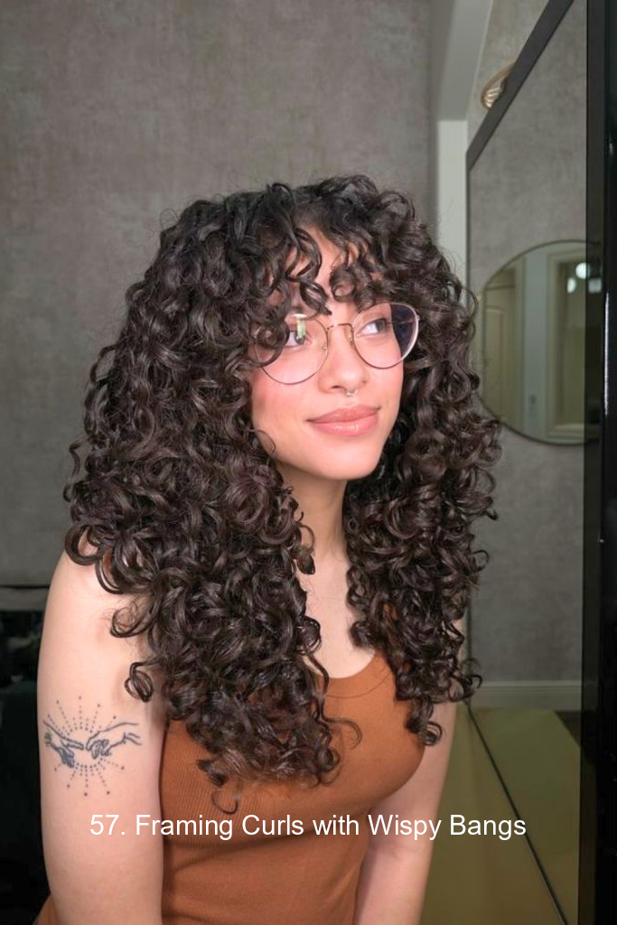 57. Framing Curls with Wispy Bangs