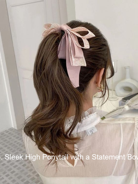6. Sleek High Ponytail with a Statement Bow
