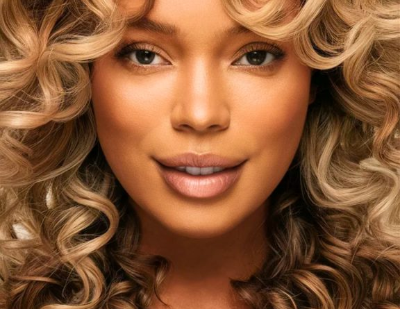 8. Face-Framing Middle Part Curls