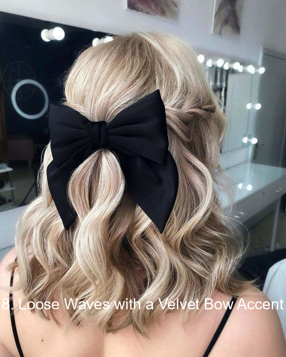 8. Loose Waves with a Velvet Bow Accent